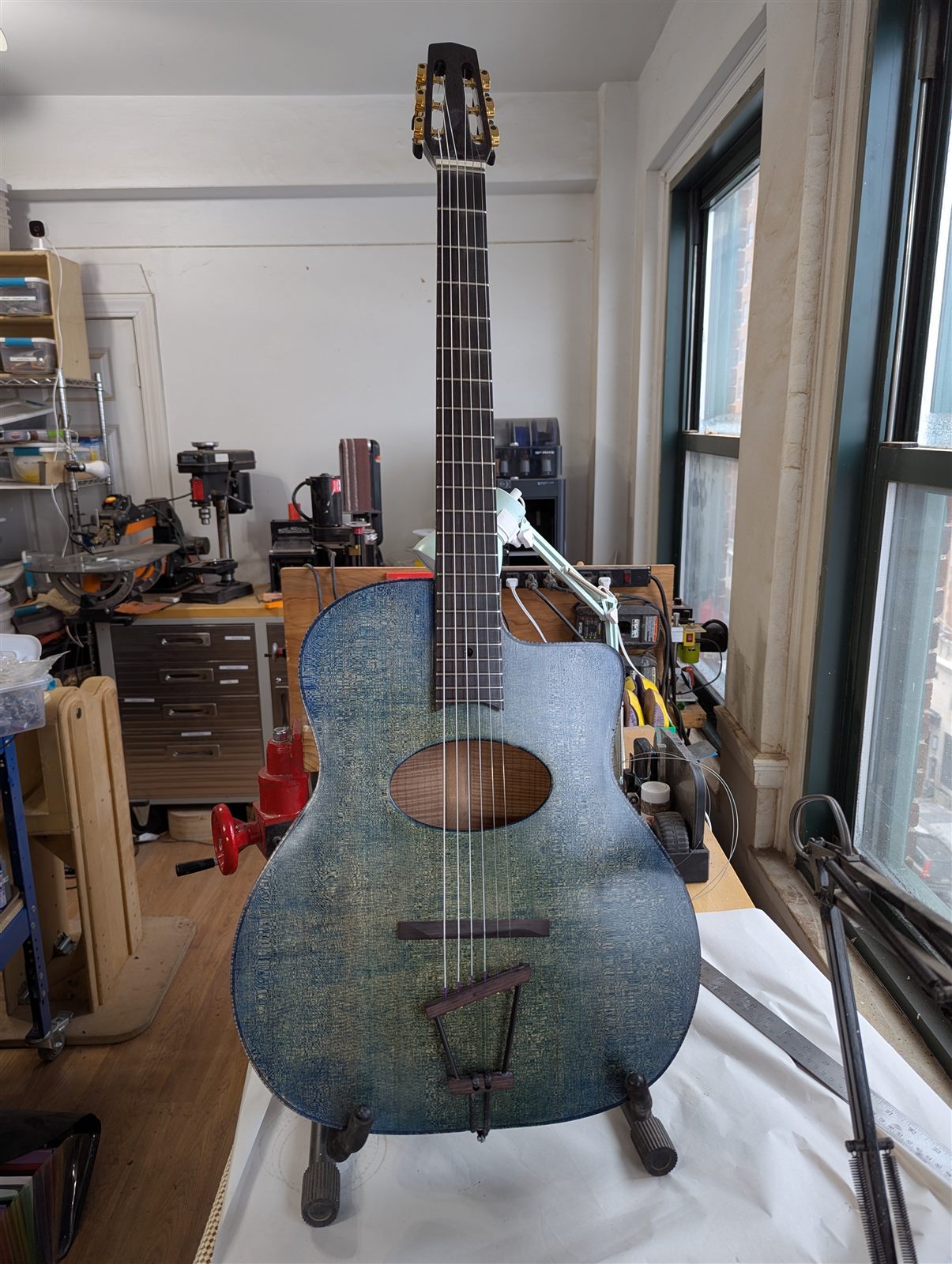 Handbuilt gypsy jazz-style guitar with indigo-blue stained spruce top by Paul McEvoy Guitars.