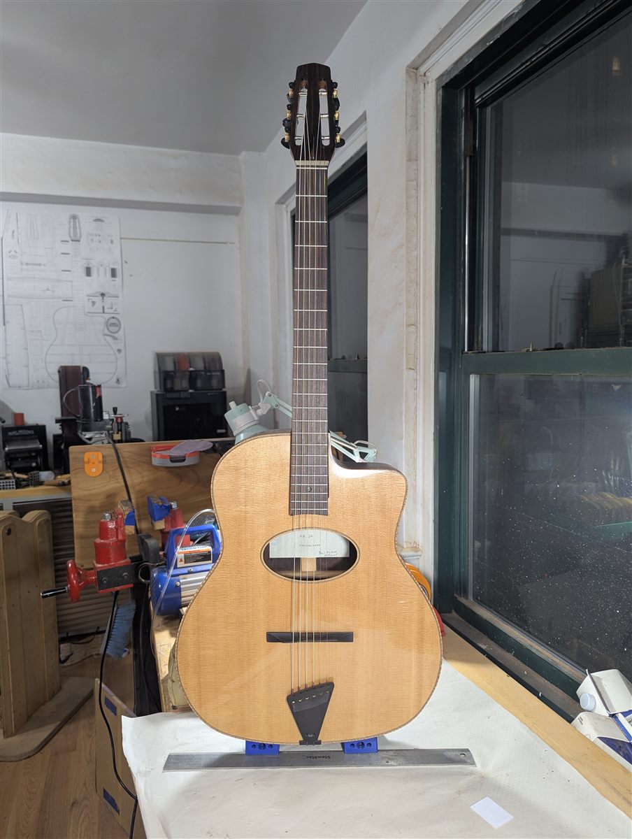 Full-body front view of the Jimmy guitar.