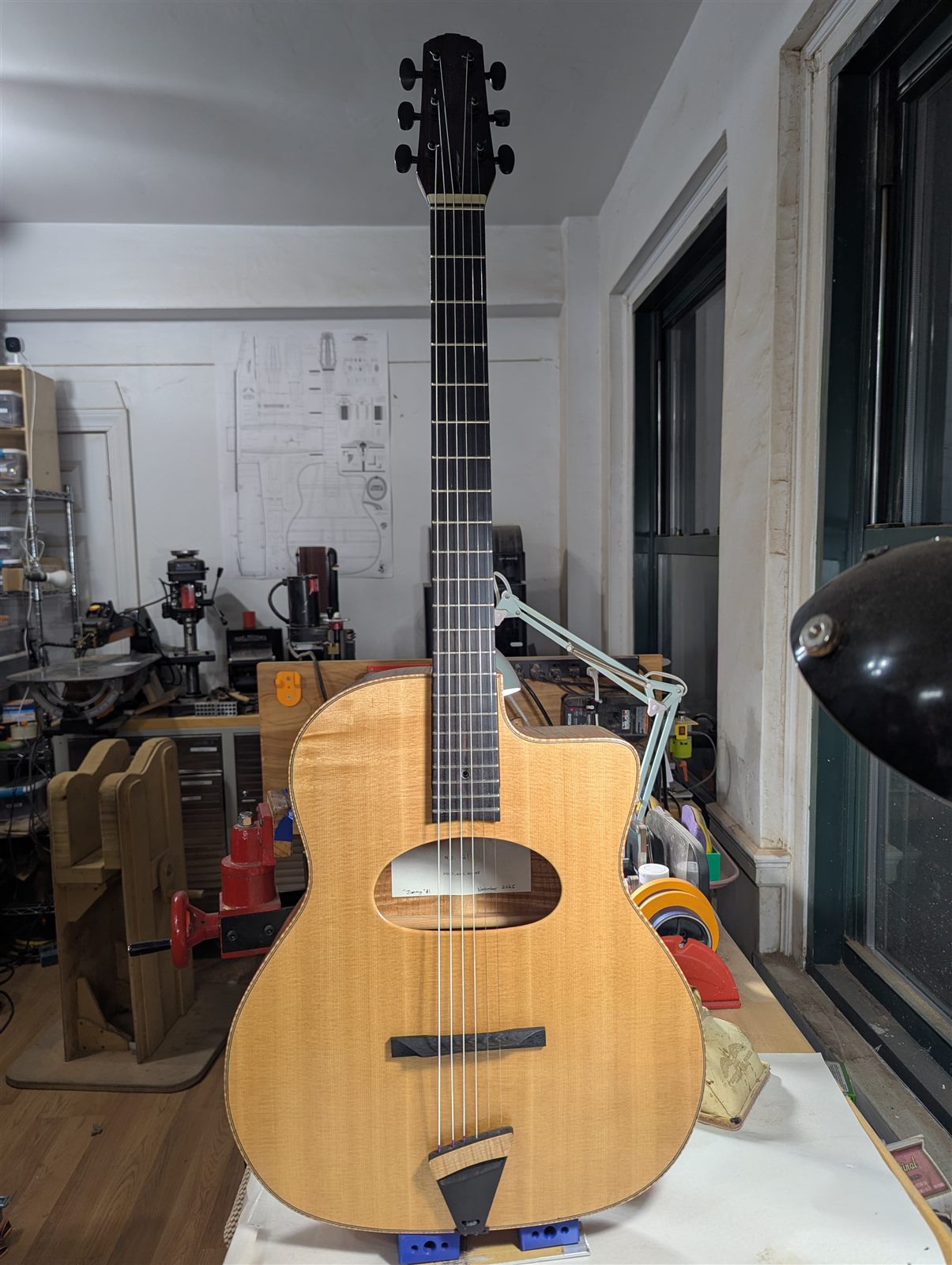 Handbuilt gypsy jazz Selmer-style guitar named 'Jimmy' with natural spruce top by Paul McEvoy Guitars.
