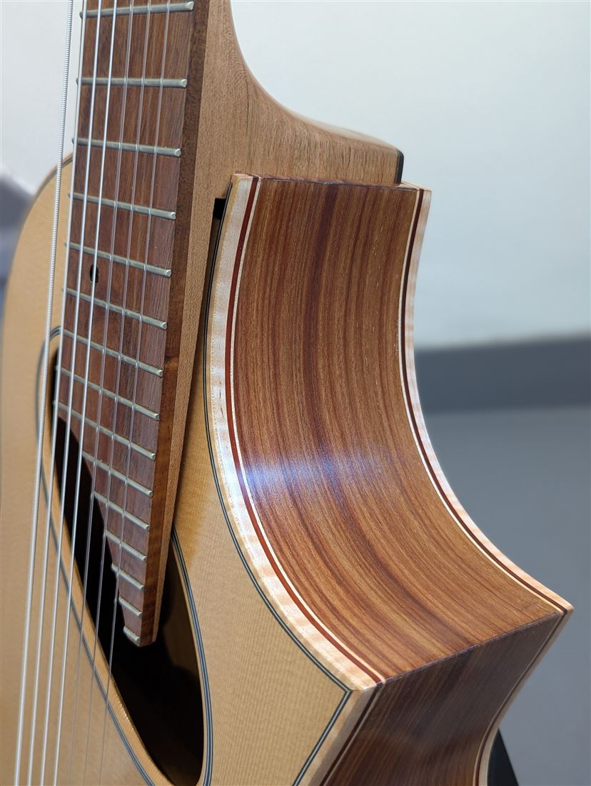 Another back view of the 7-string guitar's finish.