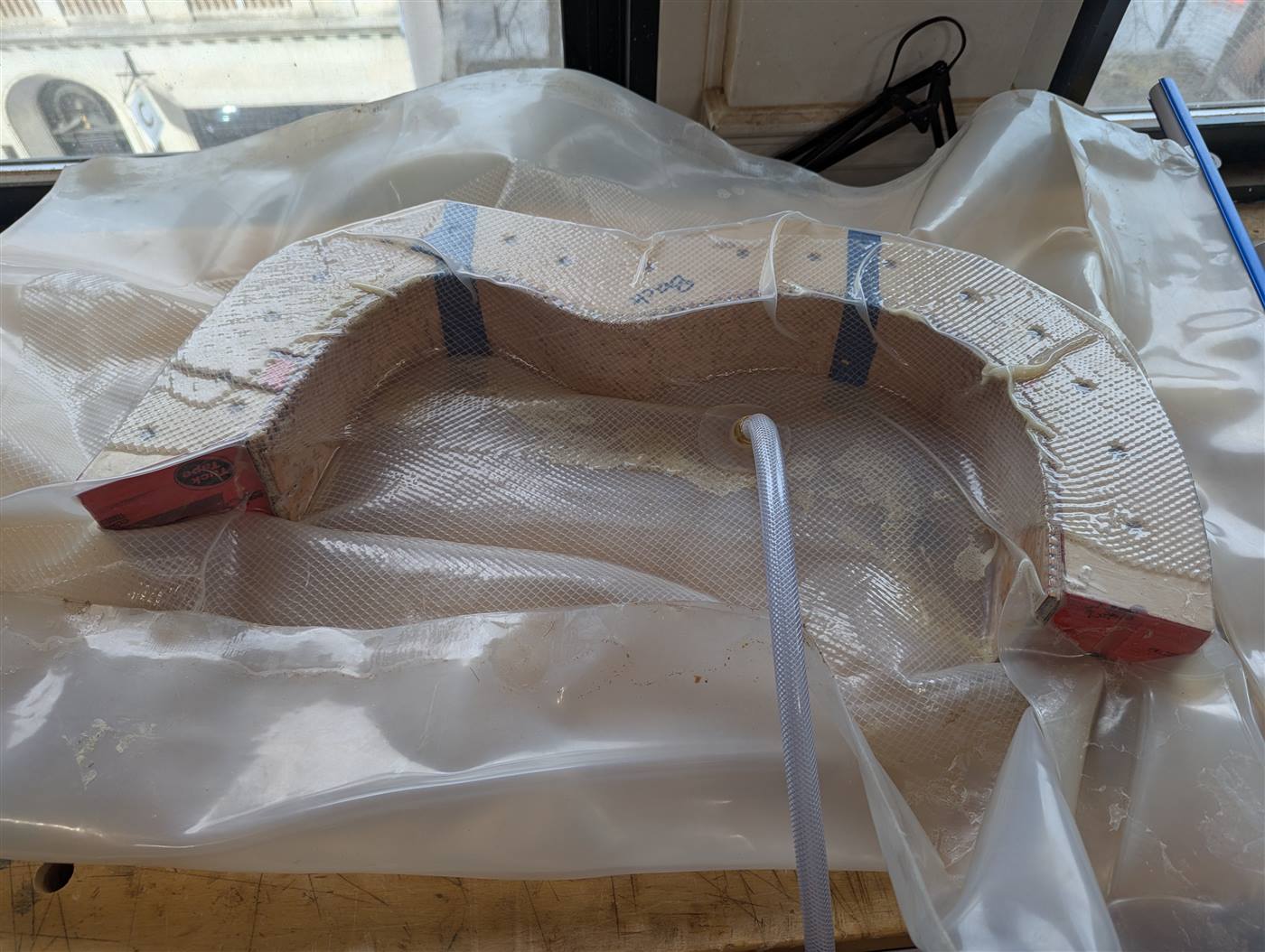 Vacuum gluing structured sides.