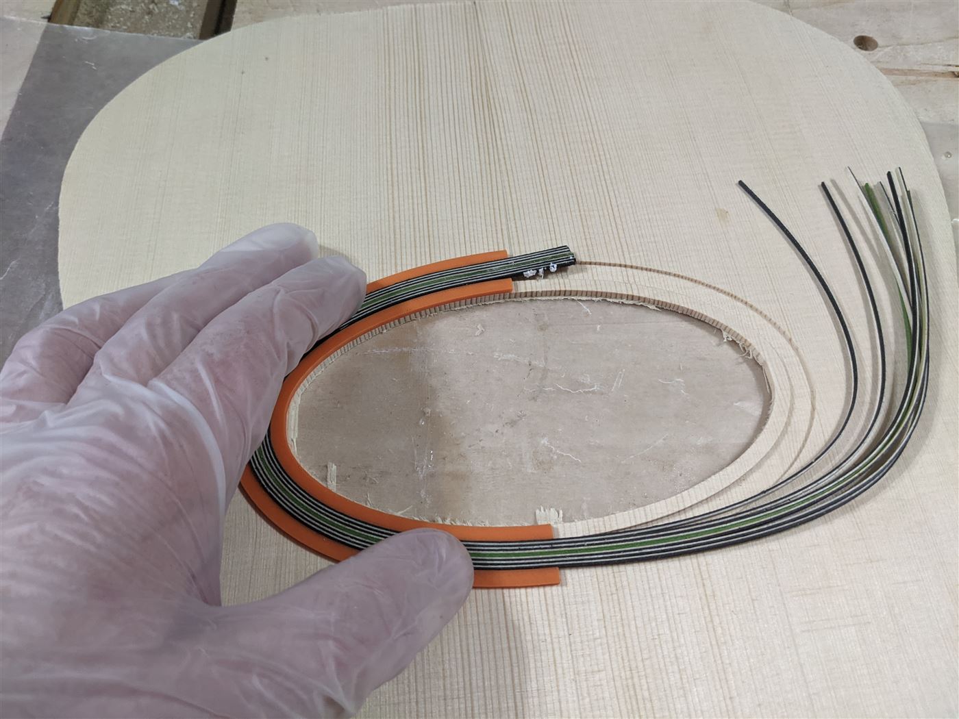 A 3d printed rosette former for a Selmer style guitar.